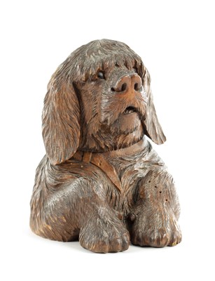 Lot 732 - A BLACK FOREST CARVED DOG INK STAND
