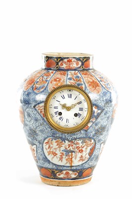 Lot 8 - A 19TH CENTURY JAPANESE IMARI VASE MANTEL CLOCK