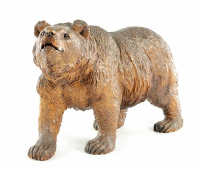 Lot 704 - A LATE 19TH CENTURY LARGE BLACK FOREST CARVED WOOD BEAR