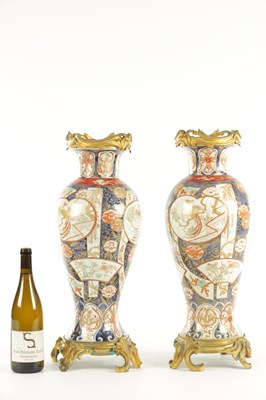 Lot 49 - A PAIR OF 17TH/18TH CENTURY JAPANESE IMARI VASES WITH ORMOLU MOUNTS