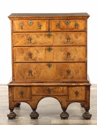 Lot 1128 - AN EARLY 18TH CENTURY FIGURED WALNUT CHEST ON STAND
