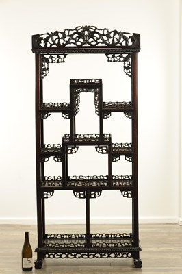 Lot 116 - A LATE 19TH CENTURY DENSE HARDWOOD CHINESE DISPLAY CABINET