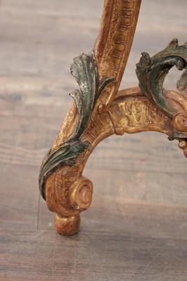 Lot 1201 - AN 18TH CENTURY ITALIAN CARVED GILTWOOD AND POLYCHROME DECORATED CONSOLE TABLE OF SMALL SIZE