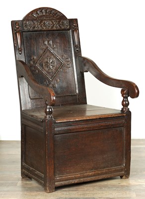 Lot 1335 - A 17TH CENTURY JOINED OAK ENCLOSED WAINSCOT CHAIR