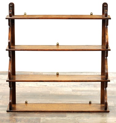 Lot 53 - A SET OF REGENCY OAK HANGING SHELVES