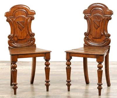 Lot 197 - A PAIR OF 19TH CENTURY OAK HALL CHAIRS