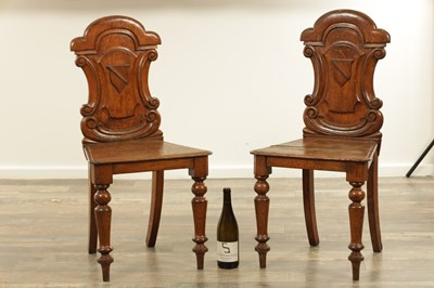 Lot 197 - A PAIR OF 19TH CENTURY OAK HALL CHAIRS