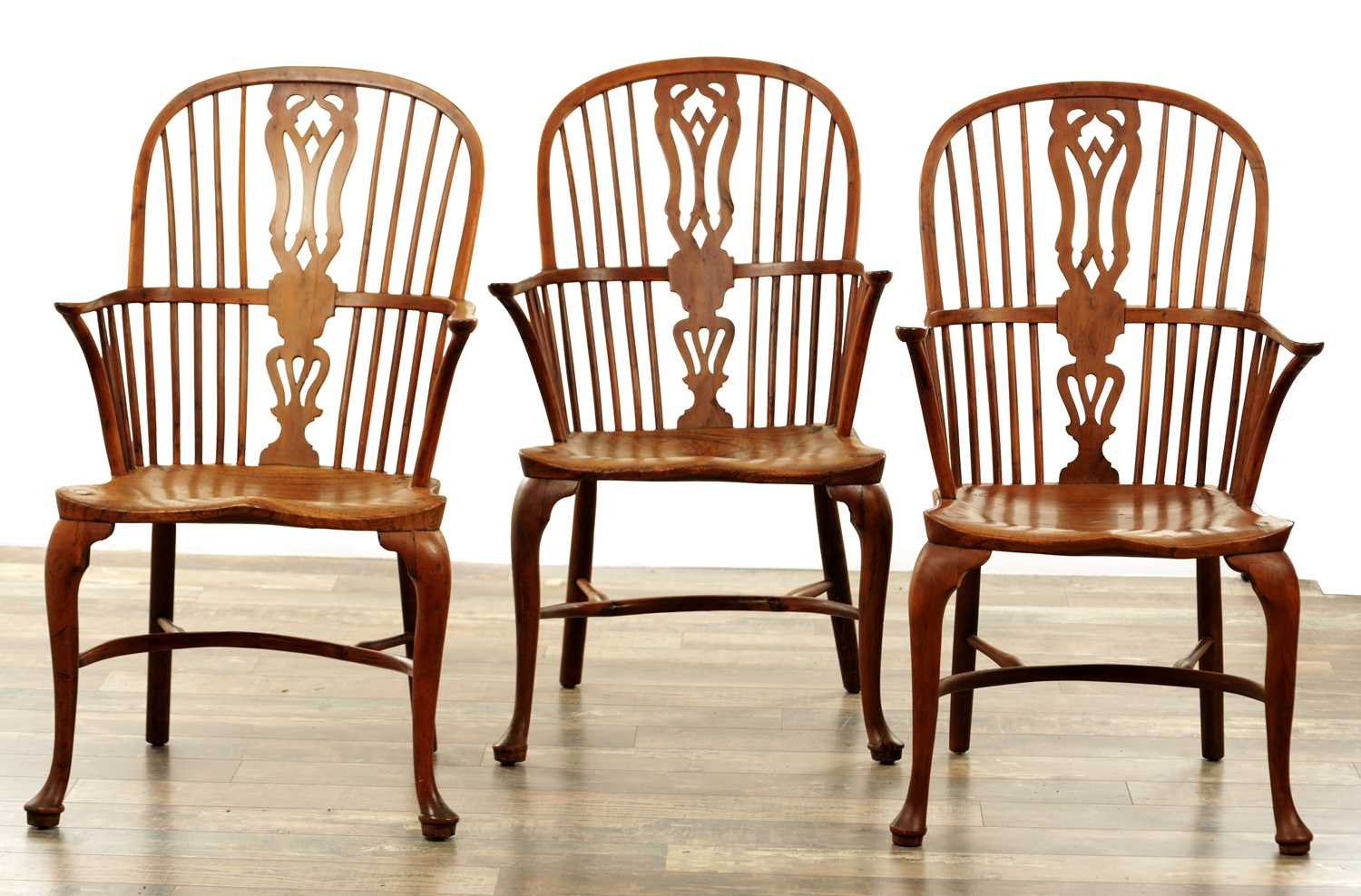 1280 - A SET OF THREE EARLY 19TH CENTURY YEW WOOD WINDSOR CHAIRS