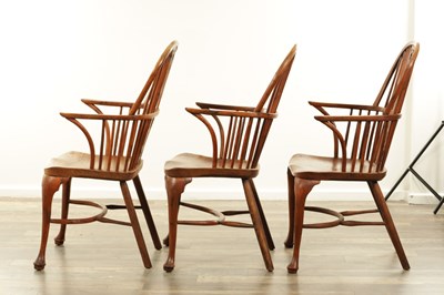 Lot 1280 - A SET OF THREE EARLY 19TH CENTURY YEW WOOD WINDSOR CHAIRS