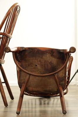 Lot 1280 - A SET OF THREE EARLY 19TH CENTURY YEW WOOD WINDSOR CHAIRS
