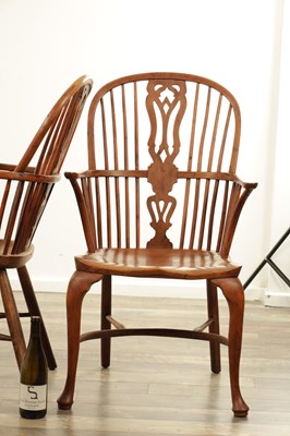 Lot 1280 - A SET OF THREE EARLY 19TH CENTURY YEW WOOD WINDSOR CHAIRS