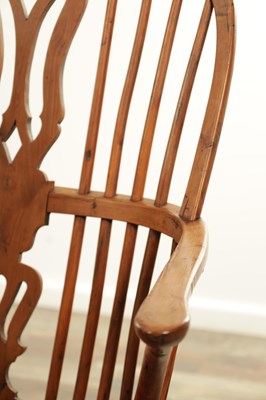 Lot 1280 - A SET OF THREE EARLY 19TH CENTURY YEW WOOD WINDSOR CHAIRS