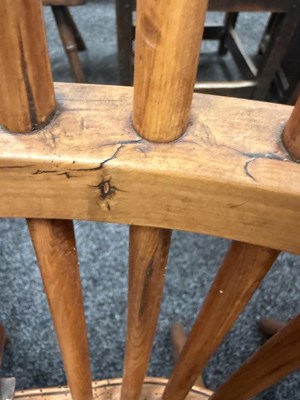 Lot 1280 - A SET OF THREE EARLY 19TH CENTURY YEW WOOD WINDSOR CHAIRS