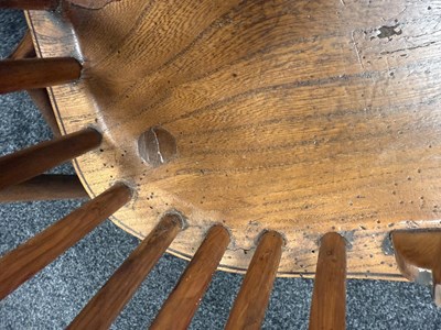 Lot 1280 - A SET OF THREE EARLY 19TH CENTURY YEW WOOD WINDSOR CHAIRS