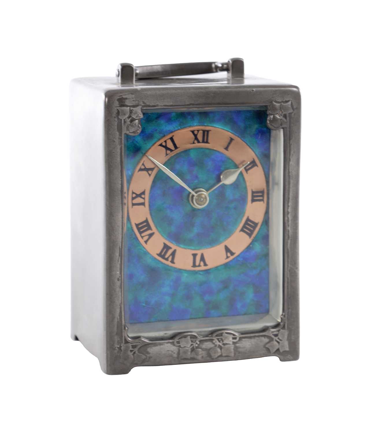 Lot 1028 - ARCHIBALD KNOX FOR LIBERTY & CO. AN ART NOUVEAU 'TUDRIC' PEWTER CARRIAGE CLOCK