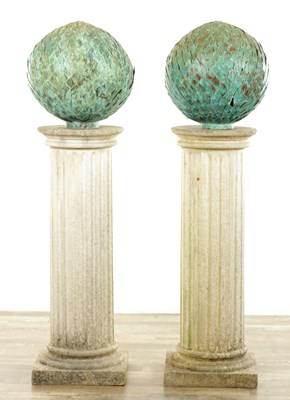 Lot 613 - A PAIR OF 19TH CENTURY COPPER AND COMPOSITE STONE ARTICHOKES ON DORIC COLUMNS