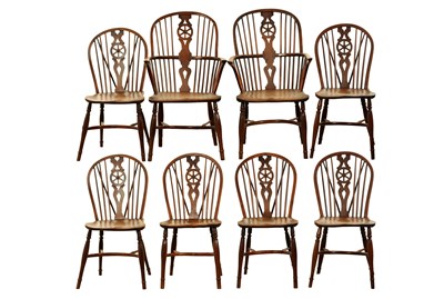 Lot 1177 - A SET OF EIGHT EARLY 19TH CENTURY YEW WOOD WINDSOR CHAIRS