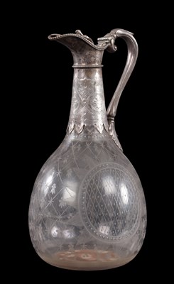 Lot 425 - A VICTORIAN SILVER MOUNTED CLARET JUG