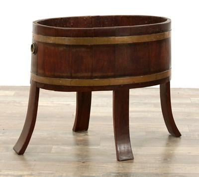 Lot 391 - A LARGE GEORGE III COOPERED MAHOGANY OVAL WINE COOLER