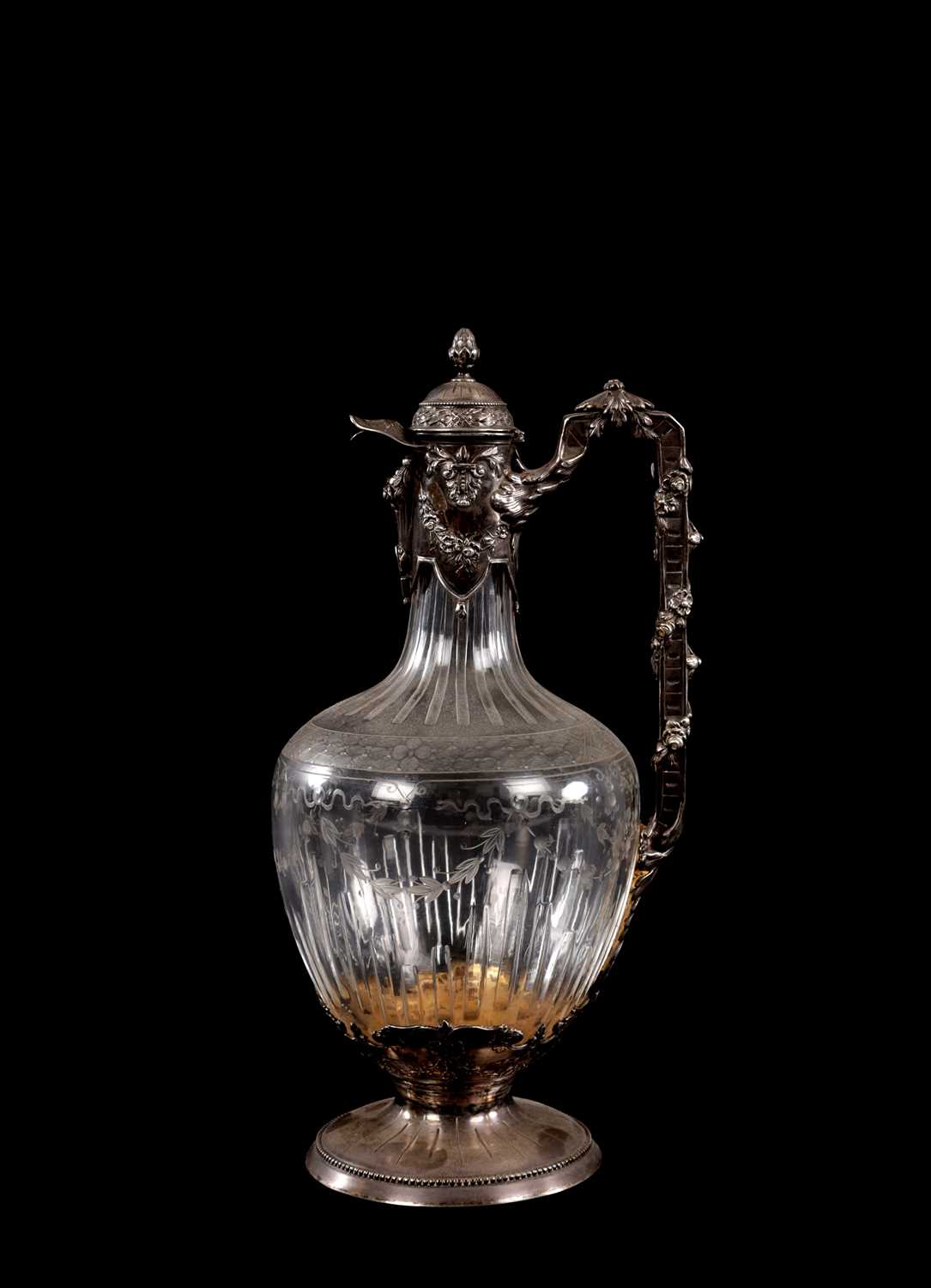 Lot 44 - A LATE 19TH CENTURY CONTINENTAL SILVER MOUNTED CUT GLASS CLARET JUG