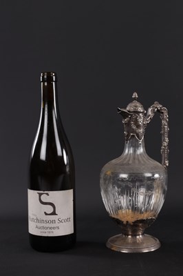 Lot 44 - A LATE 19TH CENTURY CONTINENTAL SILVER MOUNTED CUT GLASS CLARET JUG
