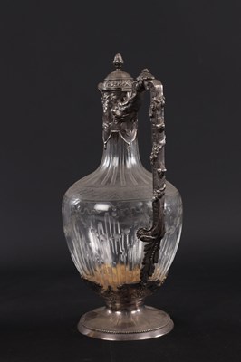 Lot 44 - A LATE 19TH CENTURY CONTINENTAL SILVER MOUNTED CUT GLASS CLARET JUG
