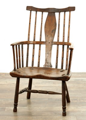 Lot 1142 - A GOOD 18TH CENTURY ASH AND ELM PRIMITIVE WEST COUNTRY WINDSOR ARMCHAIR