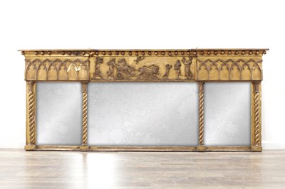 Lot 1255 - A GOOD REGENCY 'GOTHIC' OVERSIZED GILT CARVED OVER-MANTEL MIRROR
