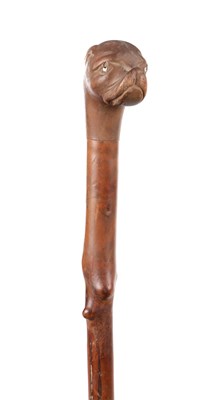 Lot 242 - A 19TH CENTURY CARVED DOGS HEAD WALKING CANE