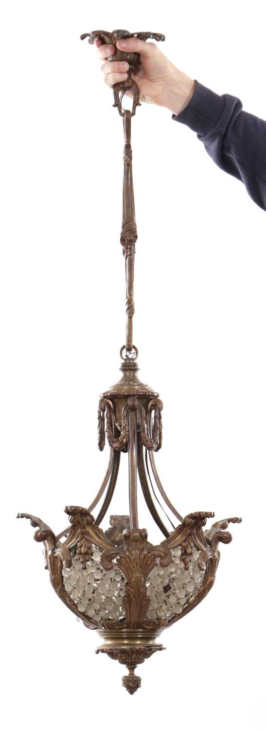 Lot 29 - AN EARLY 20TH CENTURY FRENCH GILT BRONZE HANGING LIGHT