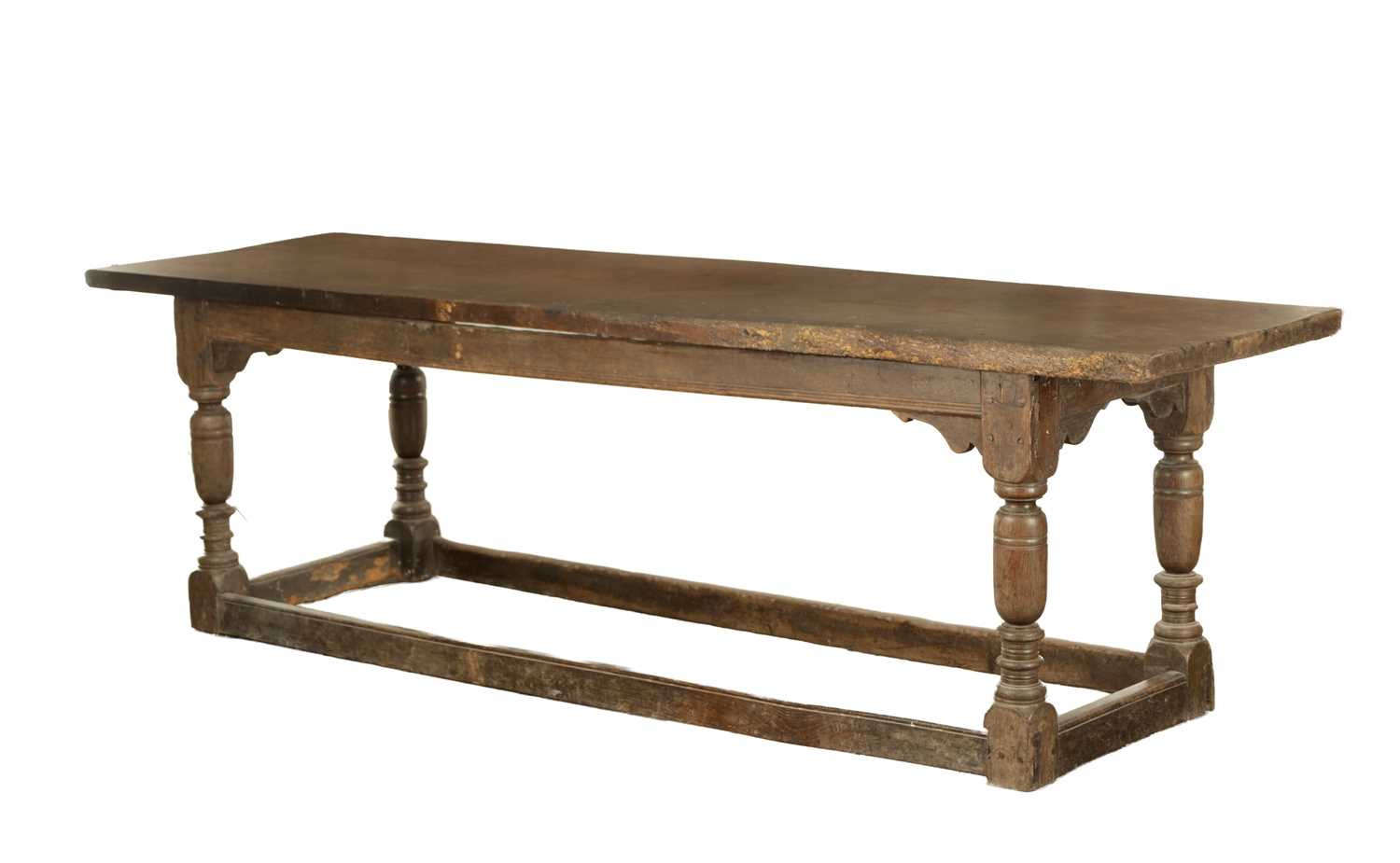 Lot 1209 - AN 17TH CENTURY OAK REFECTORY TABLE WITH ONE-PIECE TOP