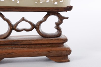 Lot 69 - A PAIR OF CHINESE RETICULATED CARVED JADE PANELS ON STANDS