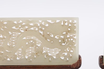 Lot 69 - A PAIR OF CHINESE RETICULATED CARVED JADE PANELS ON STANDS