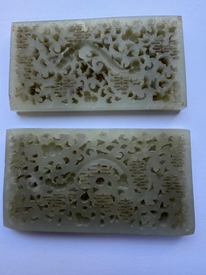 Lot 69 - A PAIR OF CHINESE RETICULATED CARVED JADE PANELS ON STANDS