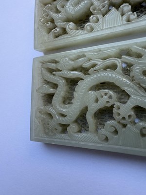 Lot 69 - A PAIR OF CHINESE RETICULATED CARVED JADE PANELS ON STANDS