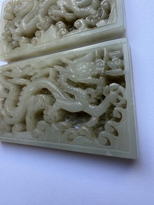 Lot 69 - A PAIR OF CHINESE RETICULATED CARVED JADE PANELS ON STANDS