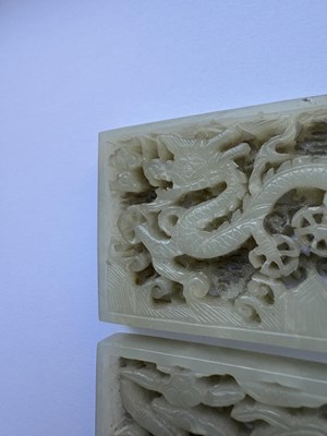 Lot 69 - A PAIR OF CHINESE RETICULATED CARVED JADE PANELS ON STANDS