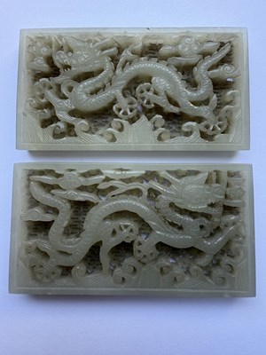 Lot 69 - A PAIR OF CHINESE RETICULATED CARVED JADE PANELS ON STANDS