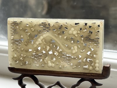 Lot 69 - A PAIR OF CHINESE RETICULATED CARVED JADE PANELS ON STANDS