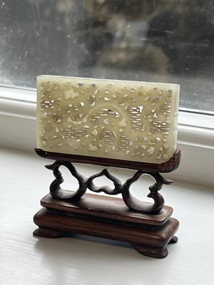 Lot 69 - A PAIR OF CHINESE RETICULATED CARVED JADE PANELS ON STANDS