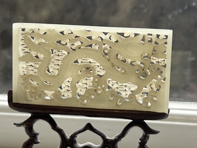 Lot 69 - A PAIR OF CHINESE RETICULATED CARVED JADE PANELS ON STANDS