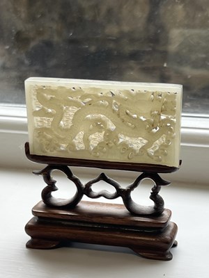 Lot 69 - A PAIR OF CHINESE RETICULATED CARVED JADE PANELS ON STANDS