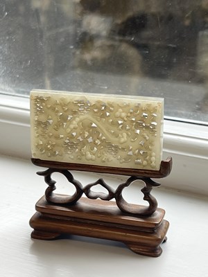 Lot 69 - A PAIR OF CHINESE RETICULATED CARVED JADE PANELS ON STANDS