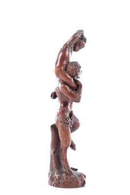Lot 738 - AN 18TH CENTURY FLEMISH CARVED FRUITWOOD FIGURAL SCULPTURE OF YOUNG BACCHUS AND A FAUN