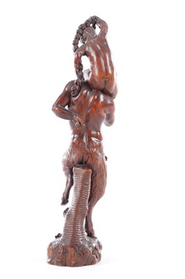 Lot 738 - AN 18TH CENTURY FLEMISH CARVED FRUITWOOD FIGURAL SCULPTURE OF YOUNG BACCHUS AND A FAUN