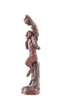Lot 738 - AN 18TH CENTURY FLEMISH CARVED FRUITWOOD FIGURAL SCULPTURE OF YOUNG BACCHUS AND A FAUN