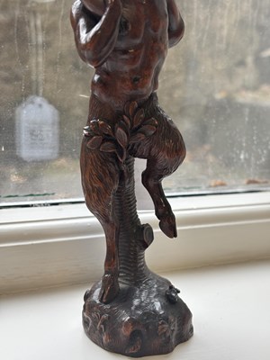 Lot 738 - AN 18TH CENTURY FLEMISH CARVED FRUITWOOD FIGURAL SCULPTURE OF YOUNG BACCHUS AND A FAUN
