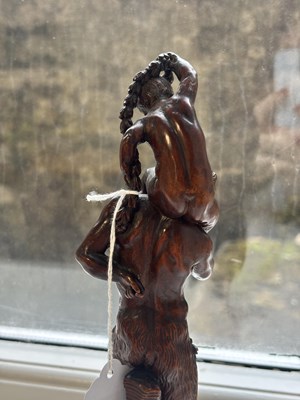 Lot 738 - AN 18TH CENTURY FLEMISH CARVED FRUITWOOD FIGURAL SCULPTURE OF YOUNG BACCHUS AND A FAUN
