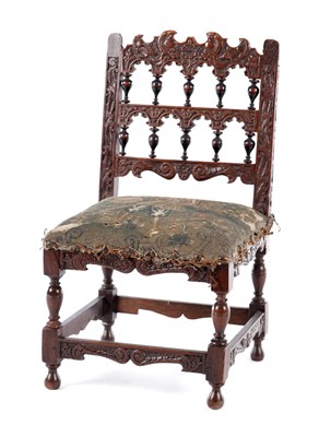 Lot 1228 - A 17TH CENTURY DUTCH EBONISED WALNUT MINIATURE CHAIR