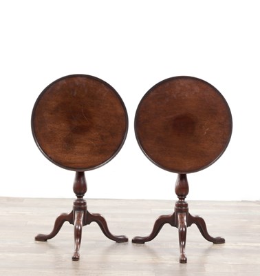 Lot 1179 - A PAIR OF 18TH CENTURY STYLE TILT TOP MAHOGANY TABLES
